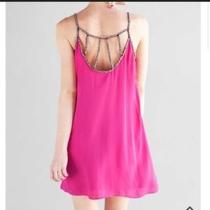 Pink flowy dress with beaded straps by Annabella